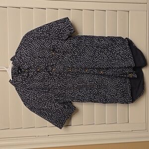 Men’s button down short sleeve shirt size LG. By Rusty